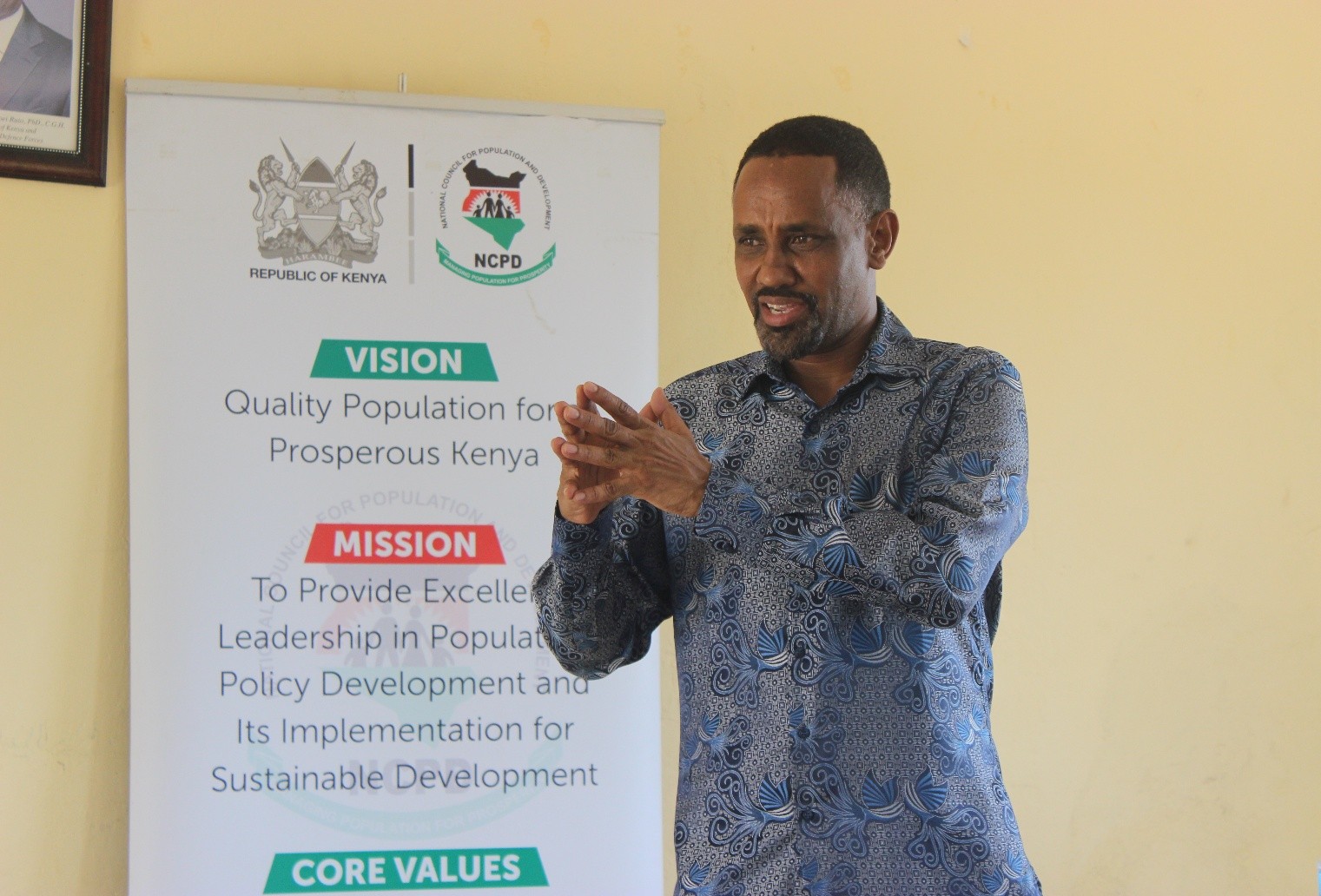 NCPD Director General Dr. Mohamed Sheikh delivers his presentation during the research dialogues in Hola Town.